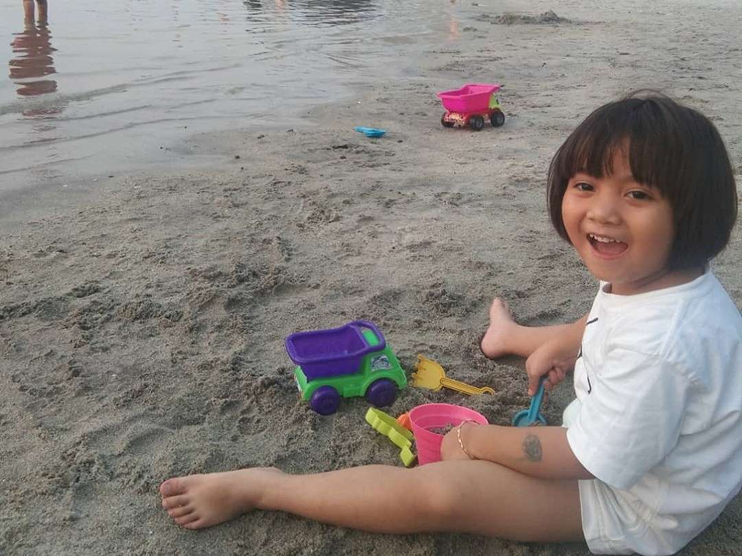 Taman bermain pasir di tepi pantai